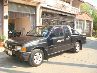 ขาย Isuzu cab 2.5 ปี1991 สีน้ำเงินดำ รถสวย เบาะหนัง พร้อมใช้งาน 100% รูปที่ 1