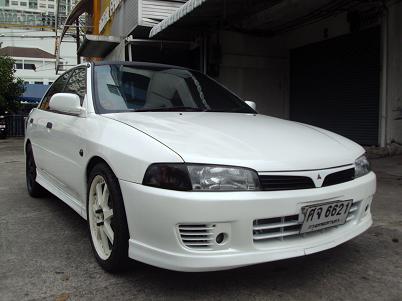 MITSUBISHI LANCER รุ่นท้ายเบ็นซ์ 1.8 AUTO 1997 สีขาวมุก อวม. CD ABS AIR BAG พ.พาวเวอร์ ก.ไฟฟ้า ซ.ล้อค เครื่องหัวฉีด กระจ รูปที่ 1