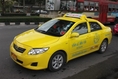 แท็กซี่ให้เช่า สีเหลืองสด โตโยต้า โคโรล่า