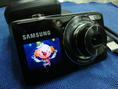 ขายกล้องดิจิตอล Samsung 2หน้าจอ รุ่น PL100 12.2 ล้านพิกเซล ซูม3X สภาพใหม่มาก 95% พร้อมของแถมครบชุด ราคา 2800 บาท