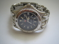 ขายนาฟิกาข้อมือ Tag Heuer ก้างปลา Boy Size สายเงินด้านสลับเงา มือสอง ของแท้