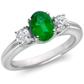 10K White Gold Oval Emerald & Diamond 3 Stone Ring (1/2 ctw)