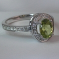 14k White Gold Engagement Band Oval Green Peridot and Round White Accents Diamond Ring (1 1/4 ctw) (.90 ct Peridot , Green Color, SI2-I1 Clarity)( 1/3 ctw Diamonds, G Color, SI2-I1 Clarity)