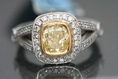 2.18 CT FANCY YELLOW CUSHION CUT DIAMOND ENGAGEMENT RING WITH ACCENTS VS-2 PLATINUM