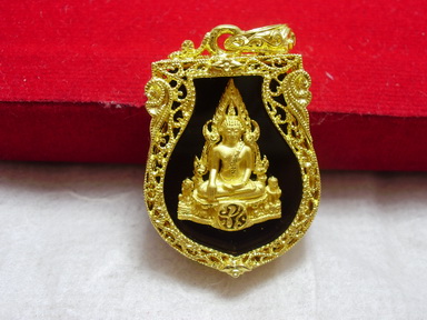 พระพุทธชินราช ภ.ป.ร เนื้อทองคำ ทรงเสมา รูปที่ 1