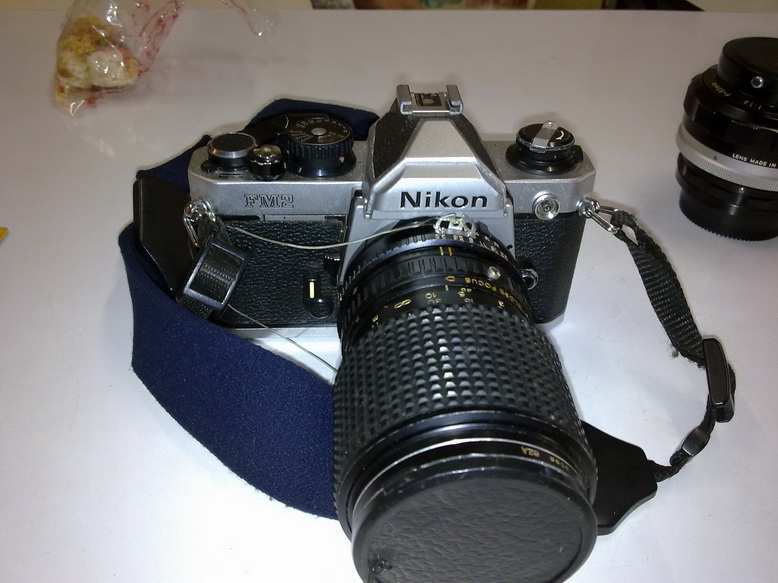 กล้อง Nikon FM2N + เลนส์ + Flash + Fillter + กระเป๋าและอุปกรณ์อื่นๆ สภาพสวยสมบูรณ์ครับ รูปที่ 1