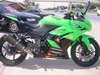 รูปย่อ ขายkawasaki ninja 250 2011 สีเขียวดำ แต่งพองามครับ เลขไมล์ 3000โล รูปที่1