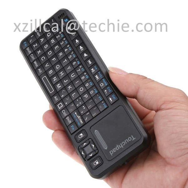 Mini Handheld 2.4G Wireless Keyboard + Laser Light Pen for Google TV รูปที่ 1