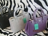 รูปย่อ ขาย Prada Saffiano งานพรีเมี่ยม หนังเรียบสวย อะไหล่ปั๊ม ขนาด 13" x 9.5" มีสายสะพายข้าง กะ ถุงผ้า รูปที่1