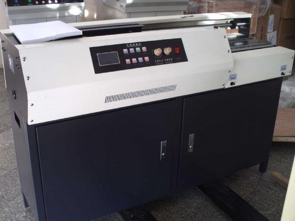 เครื่องเข้าเล่มไสกาวอัตโนมัติ รุ่น RMIT 50F PO (http://www.masterinktank.com) รูปที่ 3