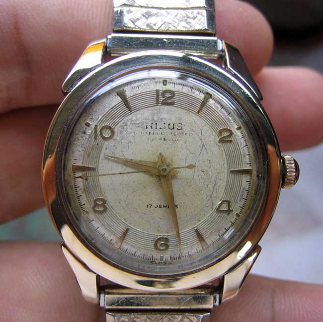 ขายขาดทุน นาฬิกา NISUS ทองแปะ ไขลาน Switch made ขนาด 34mm. ไม่รวมเม็ด เครื่องสวยมากยืนยัน รูปที่ 1