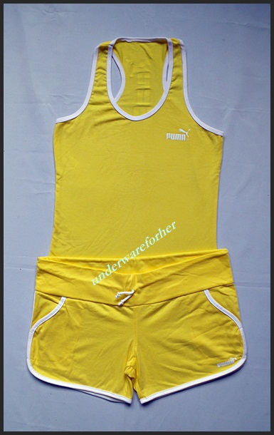 ชุดกีฬาผู้หญิง PUMA สีเหลืองขลิบขาว รูปที่ 1