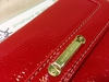 รูปย่อ กระเป๋าสตางค์ Nine west สีแดงสดใส รุ่น Lobster ราคา 990 บาท รูปที่2