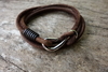 รูปย่อ กำไลข้อมือหนังกลับ สีช๊อกโกแลต  [ Chocolate un-plaited leather bracelet with fish hook fastening] รูปที่1