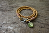 รูปย่อ กำไลข้อมือหนังแท้ สีธรรมชาติ +ตุ้งติ้งสแตนเลส [Nature color bracelet with 2-strand, double wrap bracelet with SS disc] รูปที่2