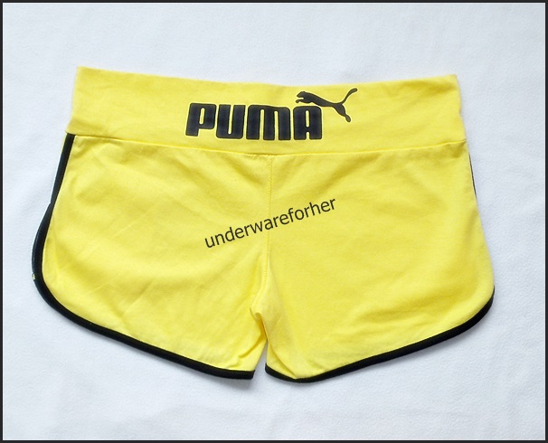 กางเกงขาสั้น PUMA สีเหลืองตัดขอบสีดำ รูปที่ 3