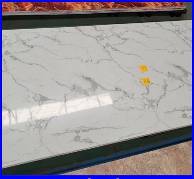 UV Marble Board แผ่นลายหินอ่อน ไม้เทียม แผ่นหินเทียม หินวีเนียร์ ตกแต่งบ้าน ตกแต่งผนัง รุ่น White Size: W1220mm * L2440mm* 2.6mm Material: Pvc Resin & Calcium Powder รูปที่ 1