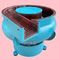   เครื่องขัดผิวโลหะแบบเขย่า (มีสะพานแยกชิ้นงาน) (Vibratory finishing machine with Separator) 